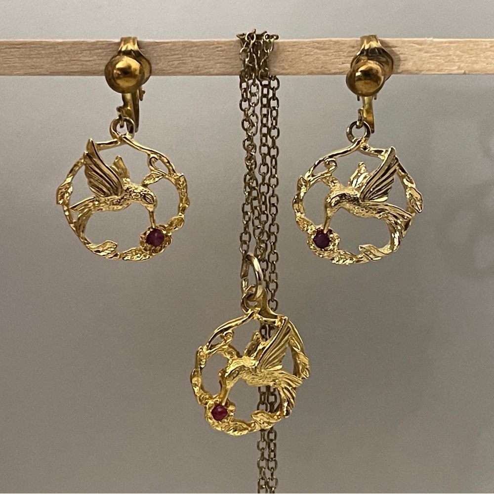 Vintage hummingbird signed JJI earrings and a pendant.